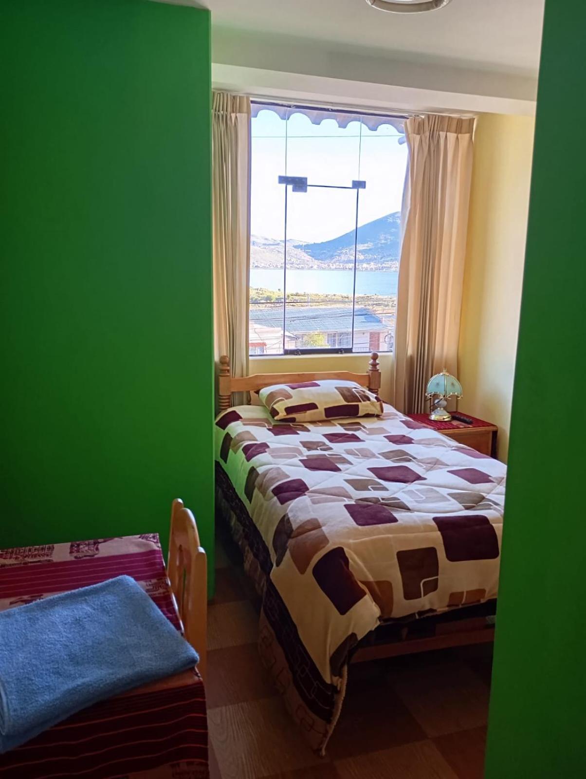 Hostal Vista Al Lago Titicaca Puno Exterior foto